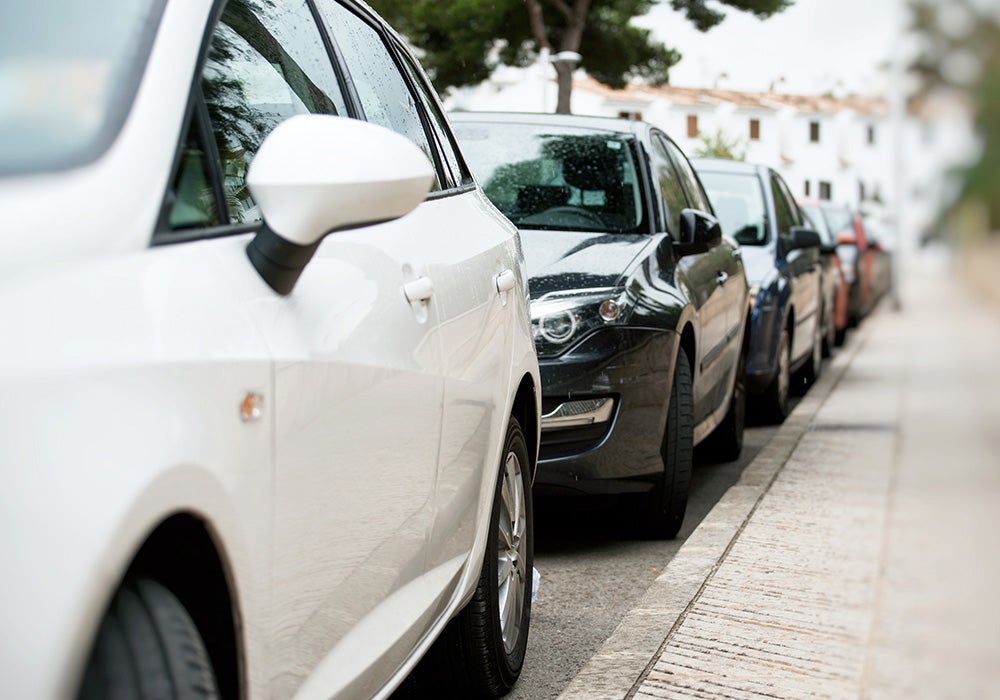 Multiple cars lined up on the road